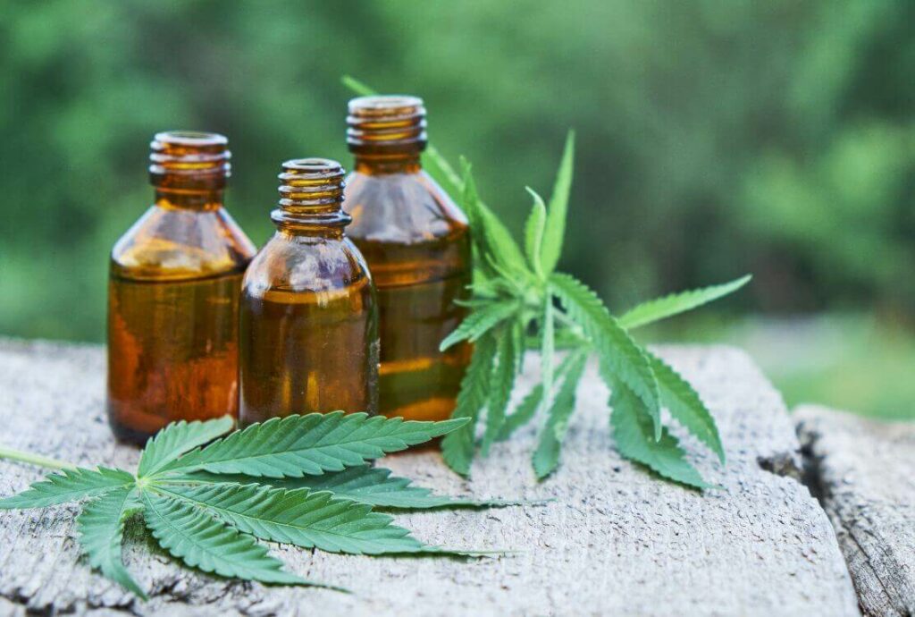 marijuana leaves and medicine bottles