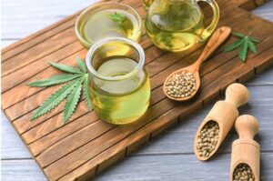 Hemp seeds, oil and marijuana leaf